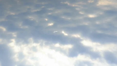 Aerial View of Cumulus Clouds with Sunlight Reflection Stock Footage 311531304
