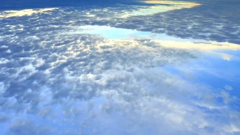 Aerial View of Cumulus Cloudscape at Sunrise or Sunset Stock Footage 310817074
