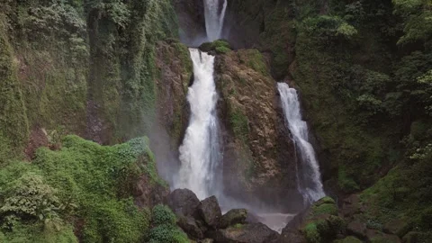 Aerial view of Curug Klenting Kuning waterfall in Central Java, Indonesia. Stock-Footage 334828974