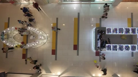 Aerial view on customers and shops in a modern shopping center Видео 58761072