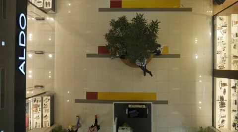 Aerial view on customers and shops in a modern shopping center Видео 58761085