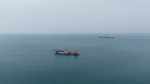 Aerial View of Cutter Suction Dredger and Cargo Ships on Open Water Vidéo 345835284