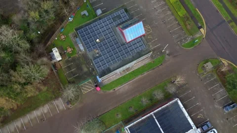 Aerial view of a cutting-edge Milton Keynes data center complex, highlighting Stock Footage 333021986