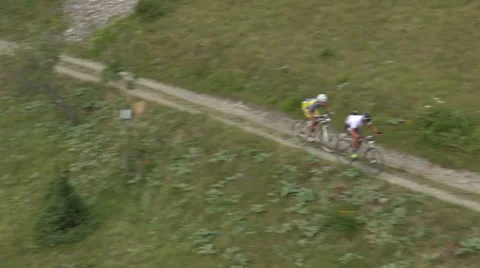 Aerial view of cyclists going uphill Stock Footage 33940823