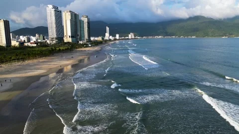 Aerial View of Da Nang's Stunning Shoreline with Modern Skyline Stock Footage 240873630