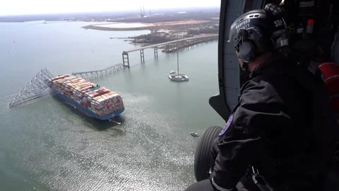 Aerial view of Dali container ship and collapsed Key Bridge, Baltimore Harbor Stock Footage 270530782