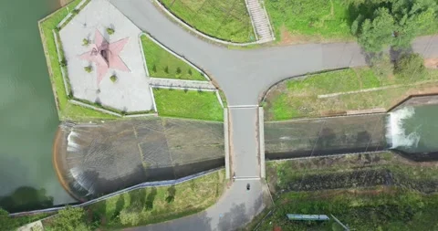 Aerial view of a dam and star monument at Tuyen Lam Lake, Da Lat, Vietnam Stock Footage 334149853