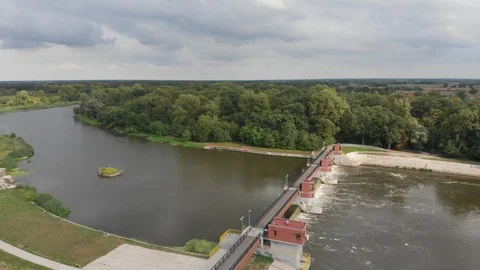 Aerial view of a dam on the Oder river, drone flying over river Stock Footage 94920047