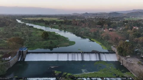 Aerial View of Dammed Serpentine River in Java at Sunset. Stock Footage 338424704