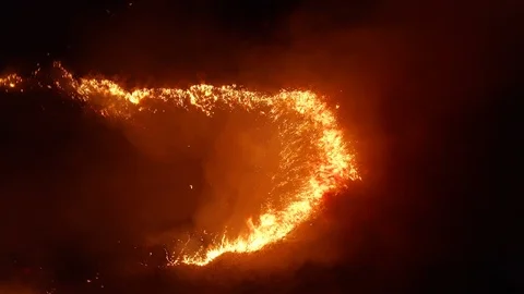 Aerial view. Dangerous fire in the field. Night fire, natural disaster. Stock Footage 115450150