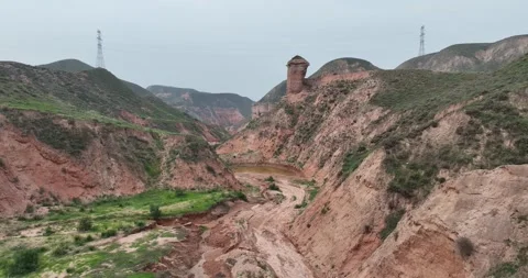 Aerial View Of Danxia Rock Pillar With Tower On Top Vidéo 312930852