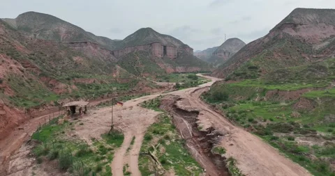 Aerial View Of Danxia Valley And Dirt Road Vídeos de archivo 312932299