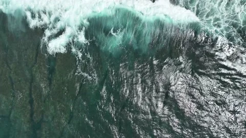 Aerial view of dark ocean waves with white wash. Stock Footage 231390859