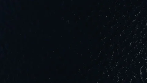 Aerial view of dark sea surface with ripples and waves Vídeo Stock 233158144