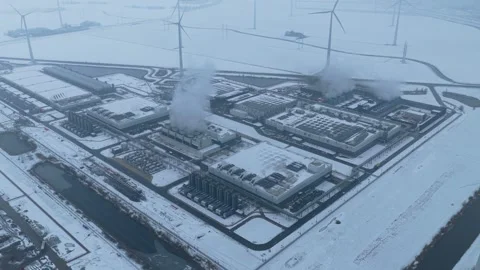 Aerial view of data center and wind turbines in winter Video stock 327904155