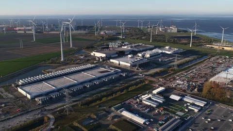 Aerial view of data center and wind turbine farm Vidéo 334119383