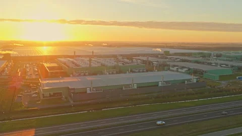 Aerial view of data center campus with traffic and sunrise in the netherlands Stock Footage 331201132