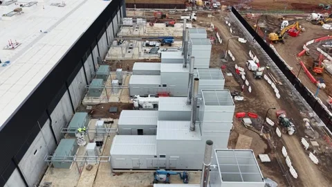 Aerial view of a data center construction site with power generators Stock Footage 340502957
