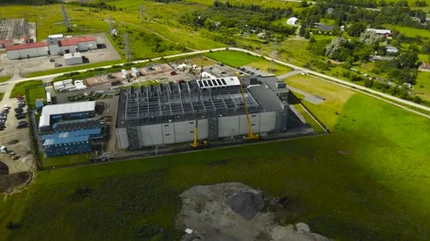 Aerial view of data center construction site with cranes, electrical substation Stock Footage 342518471