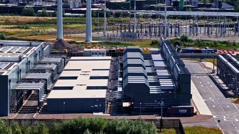 Aerial View of Data Center Construction and Power Infrastructure in Groningen Stock Footage 344429366