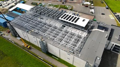 Aerial view data center construction progress with rooftop infrastructure Stock Photos