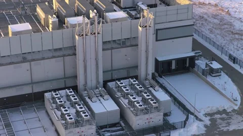 Aerial view of data center cooling units during winter Stock Footage 330856952