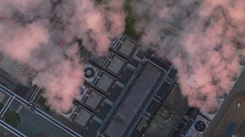 Aerial view of data center cooling system releasing steam Stock Footage 334056755