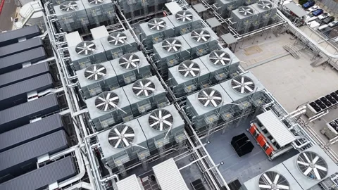 Aerial view of data center cooling system fans spinning Stock Footage 340503501