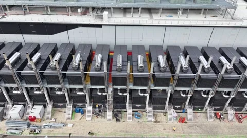 Aerial view of data center cooling units under construction 스톡 동영상 342328397