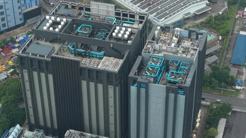 Aerial view of data center rooftop with cooling system in jakarta Stock Footage 327812495