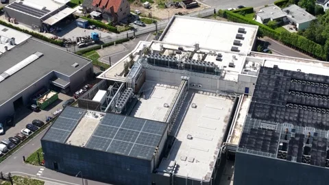 Aerial view of data center with rooftop solar panels and cooling system Stock Footage 335992644