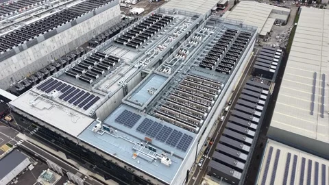 Aerial view of data center with rooftop solar panels Stock Footage 337810495