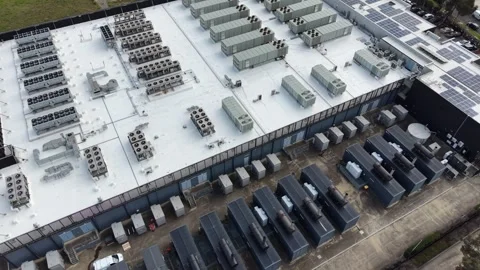 Aerial view of data center rooftop cooling systems Stock Footage 340503241