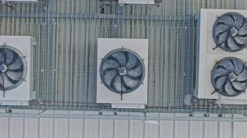 Aerial View of Data Center Rooftop Cooling Fans and Industrial Ventilation Stock Footage 341501726