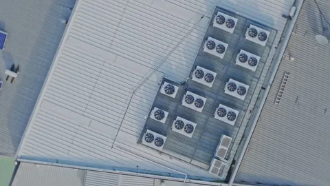 Aerial View of Data Center Rooftop With Industrial Cooling Units and HVAC Stock Footage 341502120