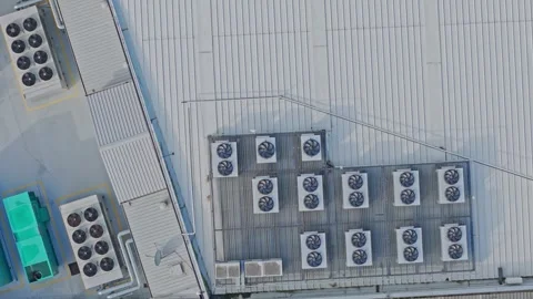 Aerial View of Data Center Rooftop Cooling Units and Industrial HVAC Systems Stock Footage 342037322