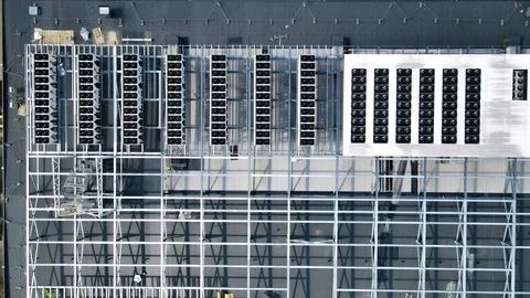 Aerial view data center rooftop construction expanding infrastructure Stock Photos