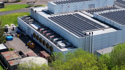 Aerial view of a data center with solar panels, United Kingdom. Stock Footage 334922372