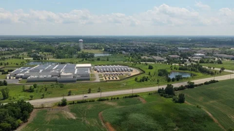 Aerial view of a data center with solar panels on the roof, AI center structure Stock Footage 340116073