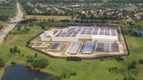 Aerial view of a data center with solar panels on the roof, AI center s Stock Footage 340116078