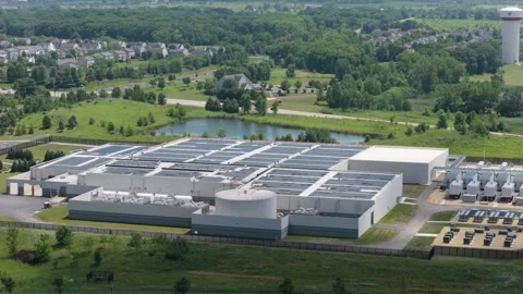 Aerial view of a data center with solar panels on the roof, AI center structure Stock Footage 340116079