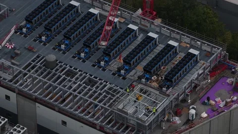 Aerial view of Data Center under construction in Munich, Germany, showcasing Stock Footage 347288250