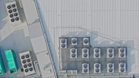Aerial View of Data Centre Rooftop Cooling Units and Industrial HVAC Systems Stock Footage 341501898