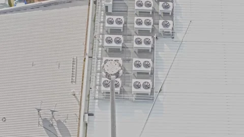 Aerial View of Data Centre Rooftop Cooling Units and HVAC Systems Stock Footage 341502136