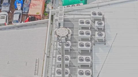 Aerial View of Data Centre Rooftop Cooling Systems and Backup Generators Stock Footage 342036671