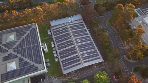 Aerial view of data centre with solar panels at dusk Stock Footage 348038799