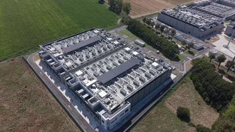 Aerial view of the DATA4 campus, showing a substantial technology facility and Stock Footage 346013701