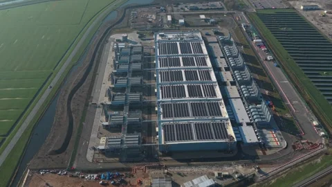 Aerial view of datacenter building exterior and computing infrastructure Stock Footage 334056975