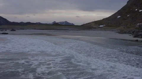 Aerial view at dawn of Storsandnes beach in the Lofoten Islands, Norway. Stock Footage 153922453