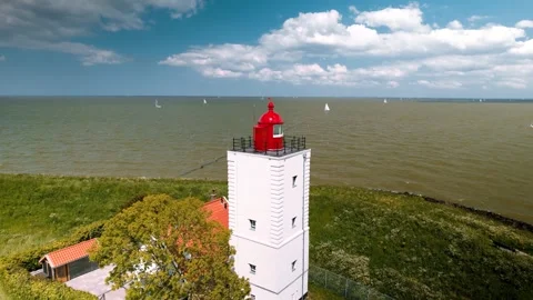 Aerial view of De Ven light house and wildflowers in the spring time in the.. Stock Footage 280737329
